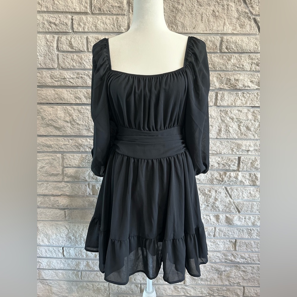 Black ruffle hem dress